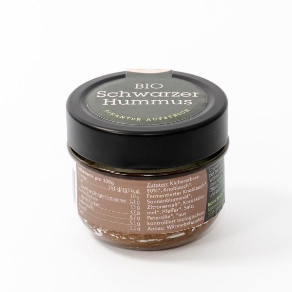 Seitenansicht des Hummus-Glases mit Etikett und Zutatenliste.